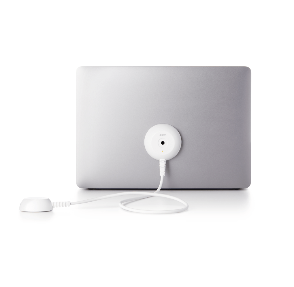 Laptop AOP bianco Laptop AOP a un laptop argentato