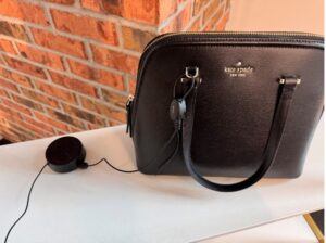 Zips con avvolgitore regolabile su borsa